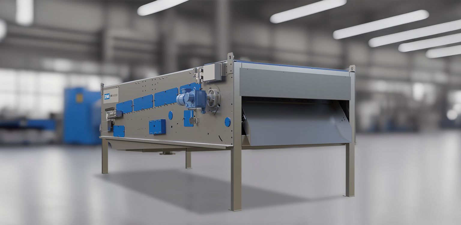 In einer Fabrik steht eine Maschine auf einem Tisch.