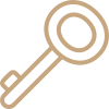 A line drawing of a key with a circle in the middle.