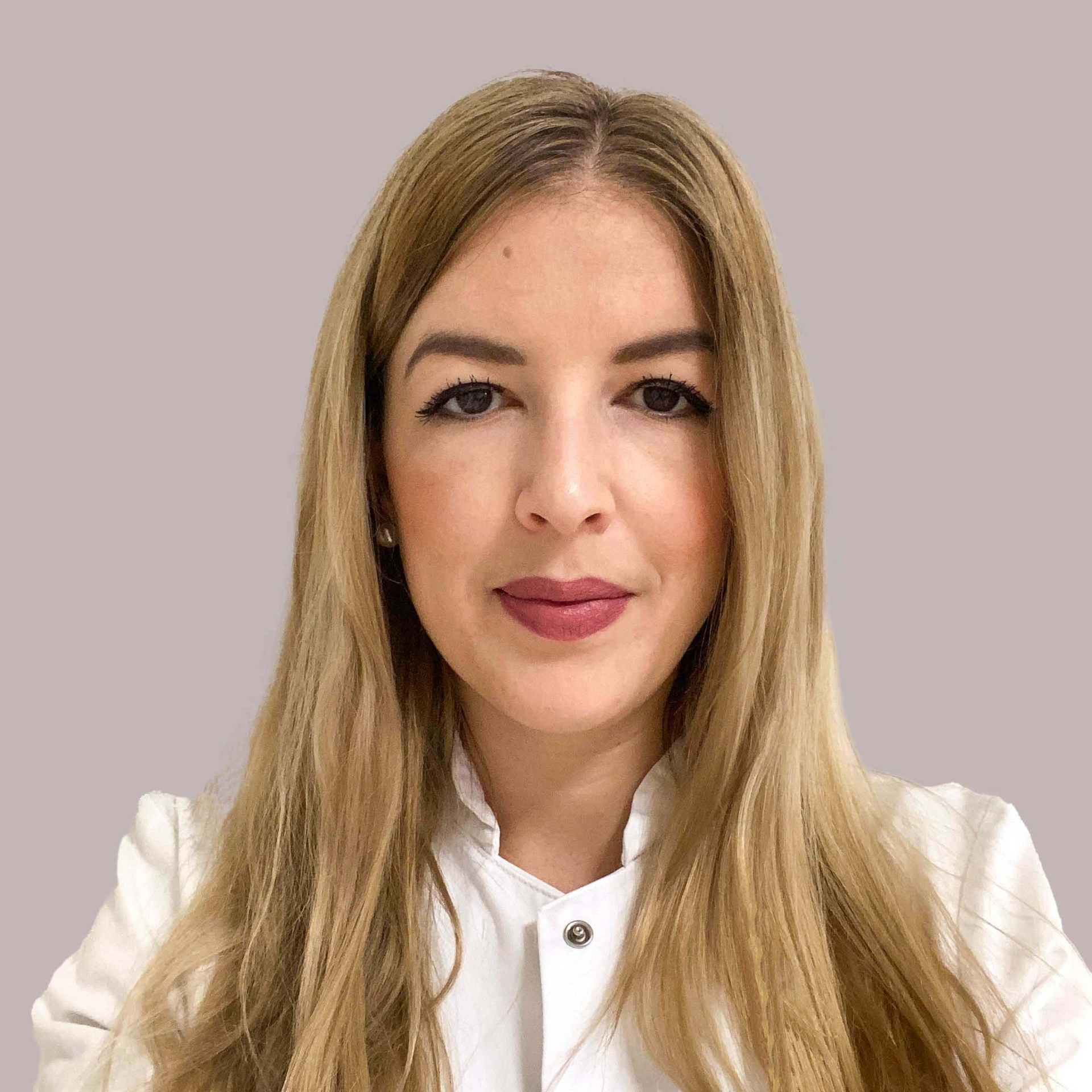 Ein grauer Kreis mit dem Gesicht einer Person darin.