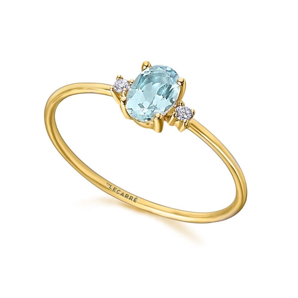 goldener Ring mit funkelndem Stein von LECARRÉ