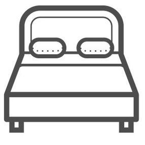 Un dibujo en blanco y negro de una cama con dos almohadas encima.