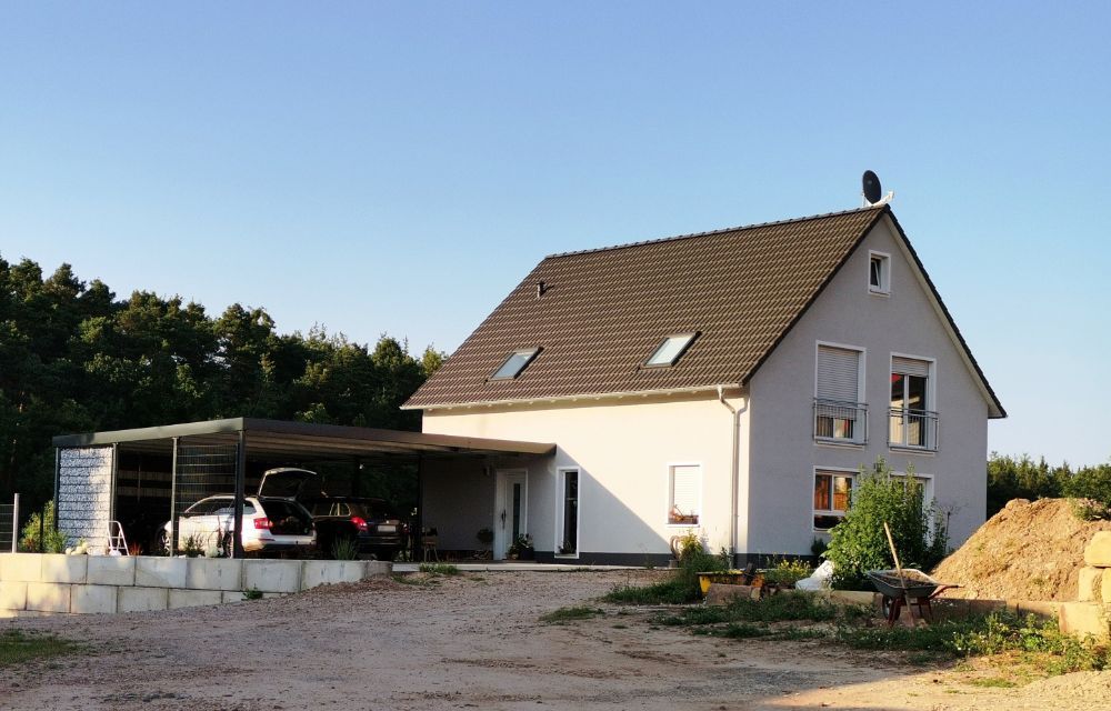 Icon Einfamilienhaus mit großer Garage