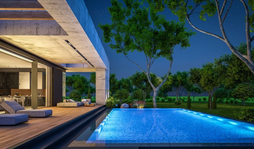 Casa moderna con patio iluminado y piscina 