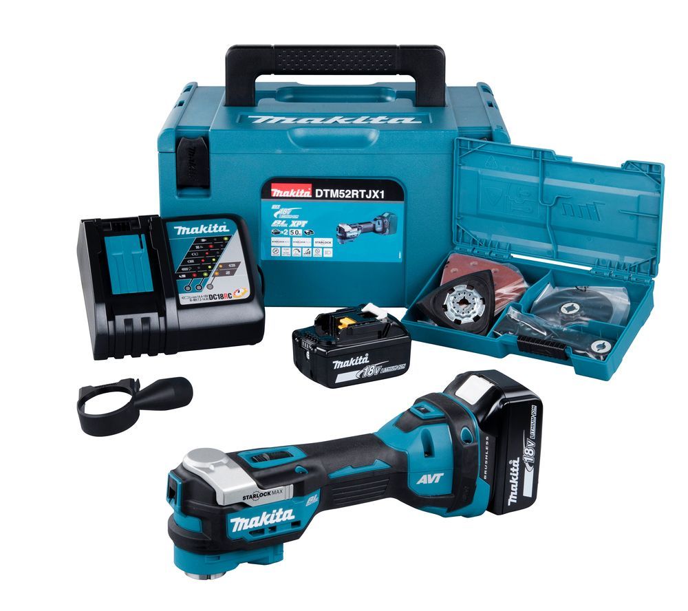 Un utensile multifunzione a batteria Makita con caricabatterie e scatola.