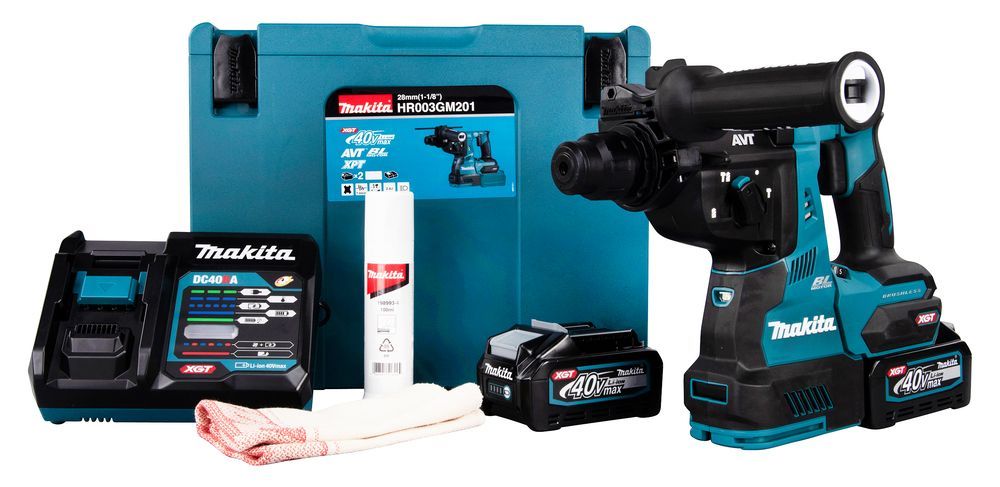 Un trapano a percussione a batteria Makita è appoggiato accanto a una scatola Makita.