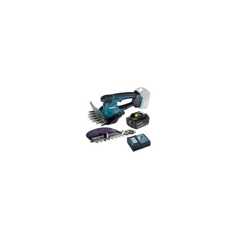 Un tagliasiepi a batteria Makita con batteria e caricabatteria.