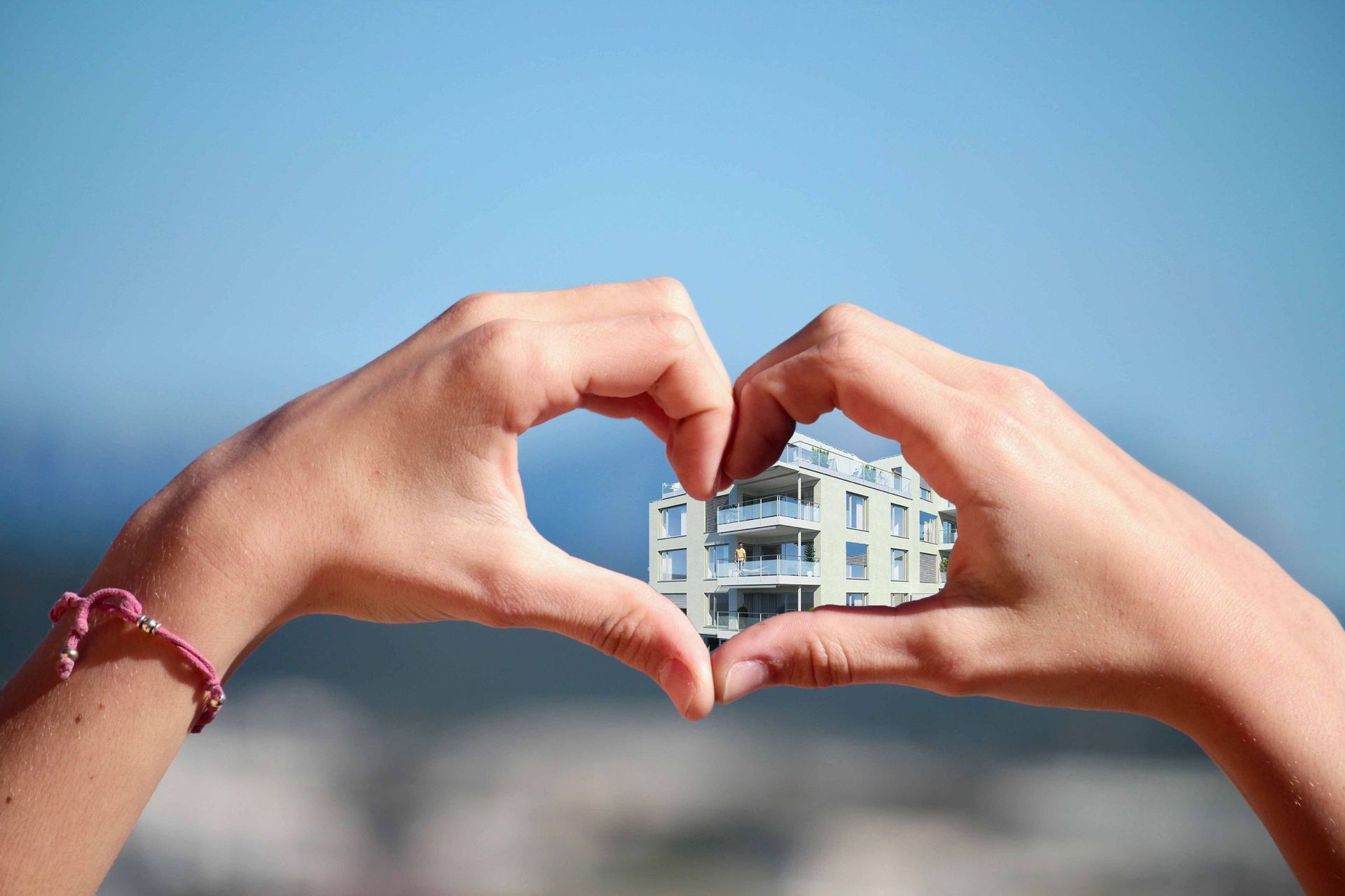 Immobilie Herz aus Händen