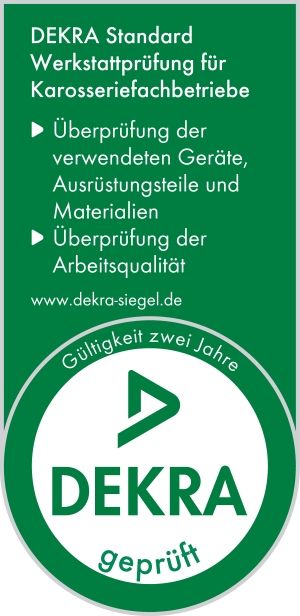 Green DEKRA inspection seal with German text for workshop quality testing, “geprüft” and “Gültigkeit zwei Jahre”