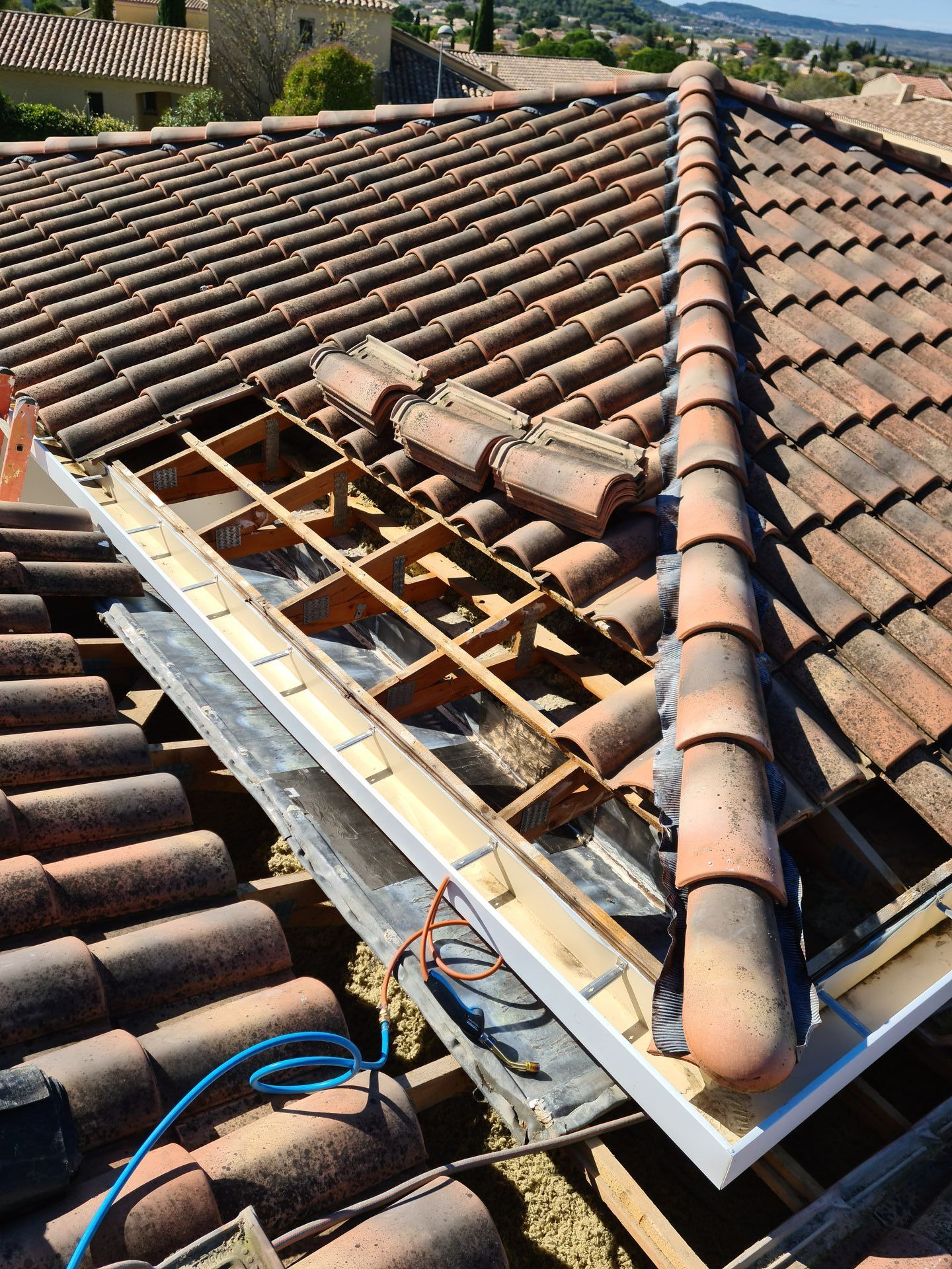 Tuiles et gouttières