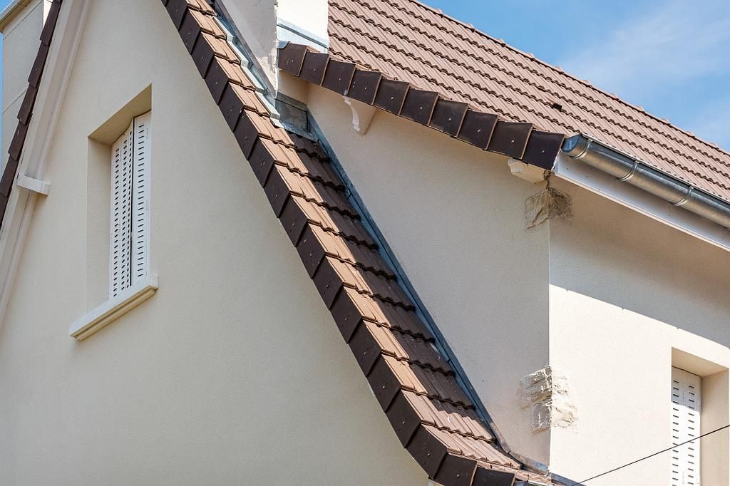 Couverture et façade de maison