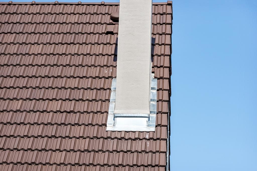 Couverture et rénovation de cheminée