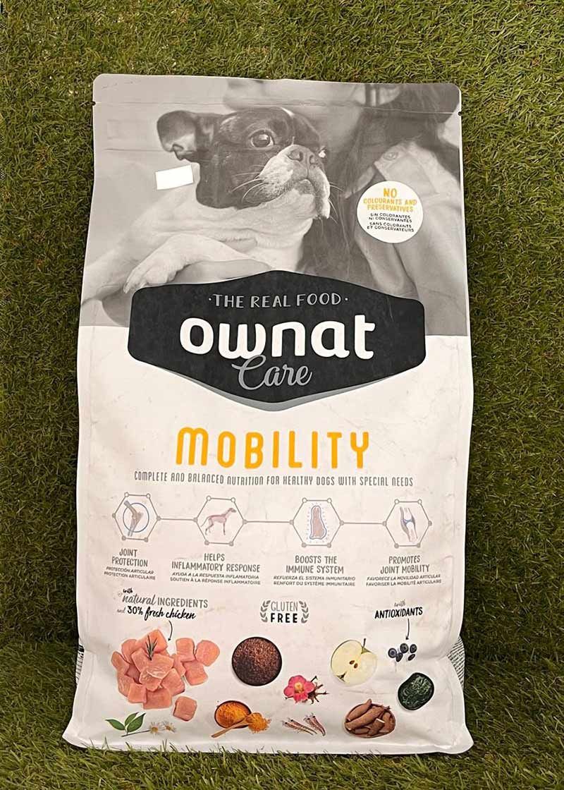 Bolsa de comida seca Royal Canin para gatos Mobility, envase blanco y gris con foto de gato e iconos de huellas.