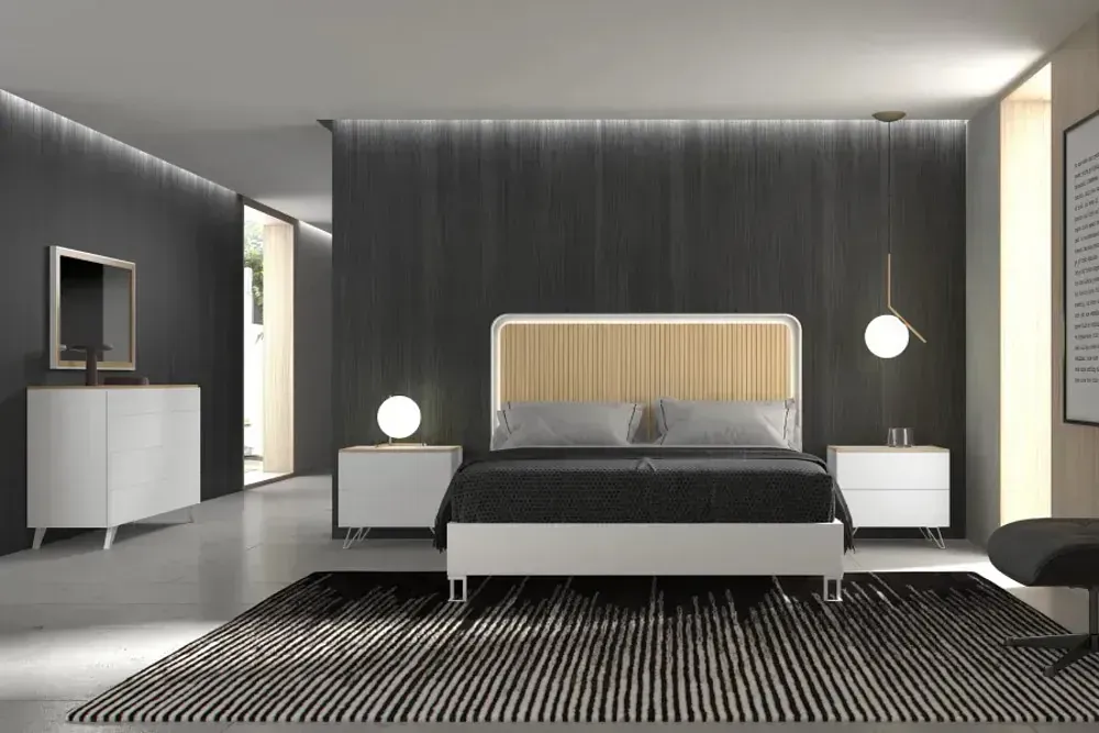 Dormitorio moderno con paredes grises, muebles blancos, una cama y una alfombra en blanco y negro.
