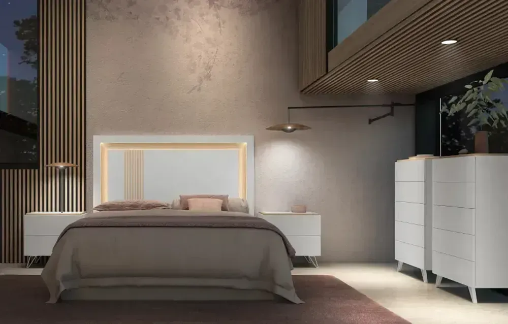 Dormitorio moderno con muebles blancos, paredes neutrales e iluminación acentuada.