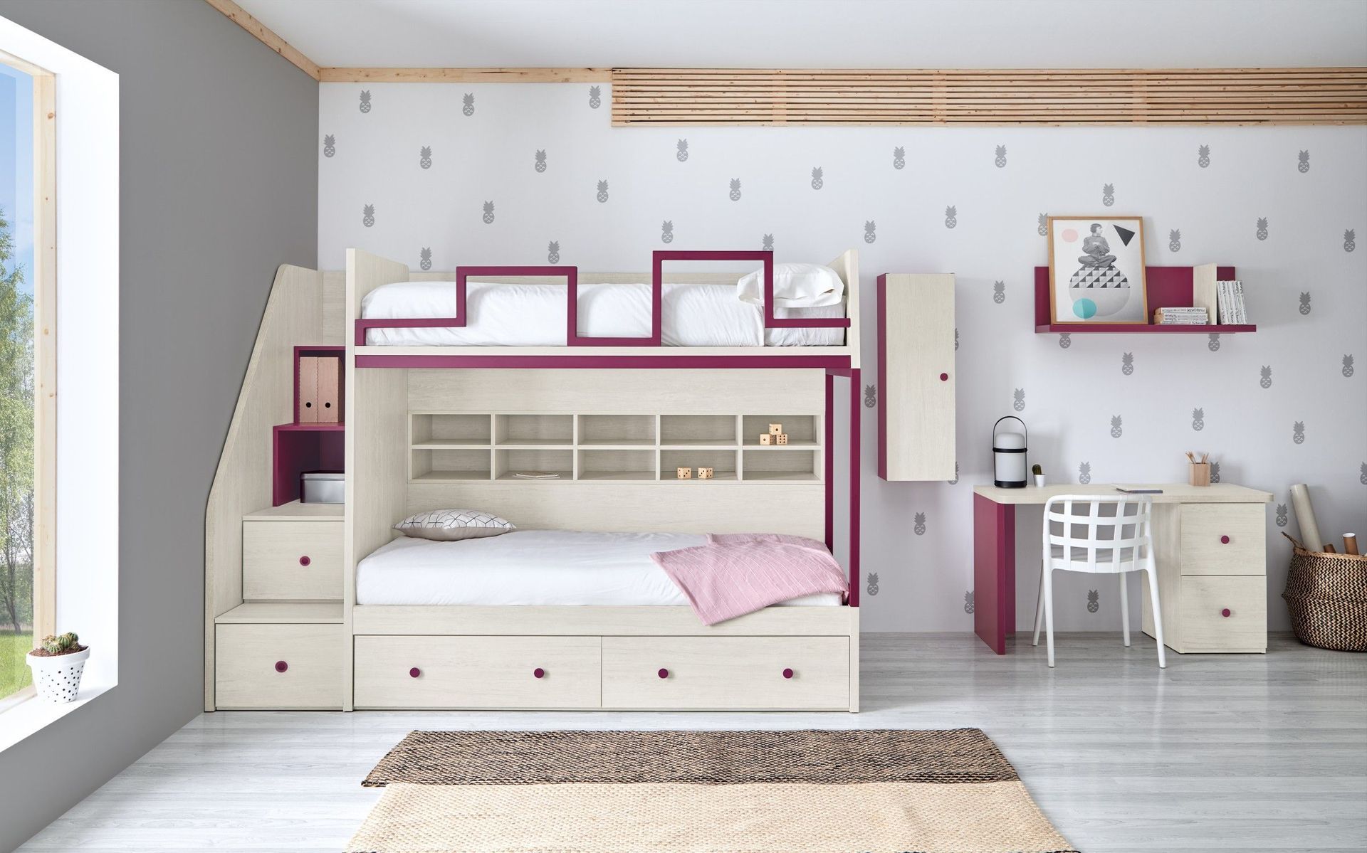 Un dormitorio con una litera y un escritorio.