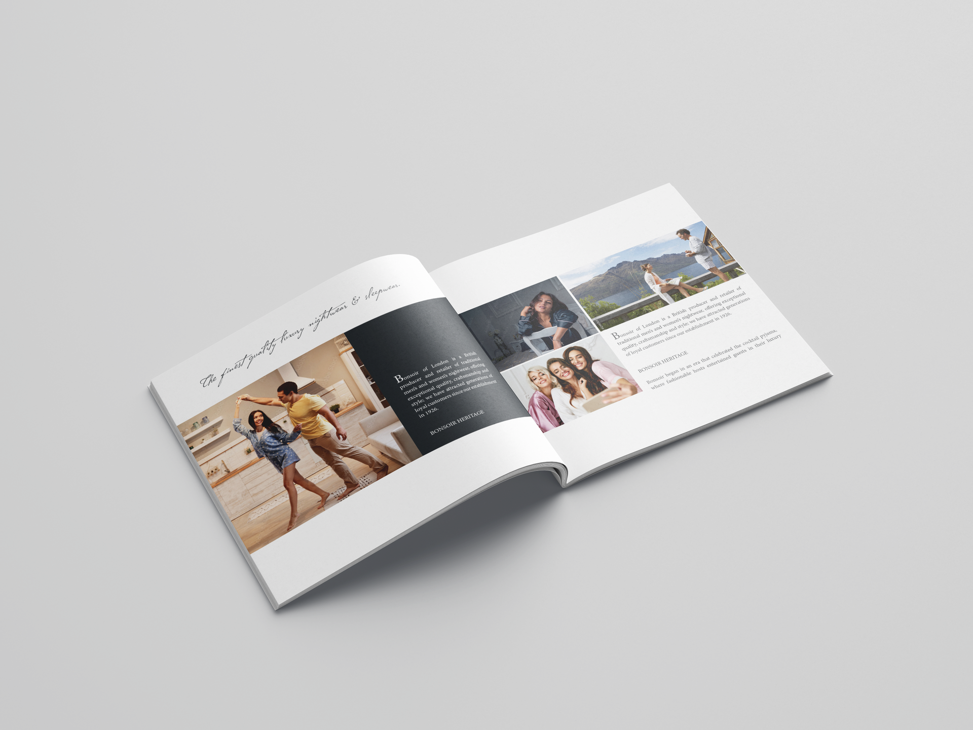 An open photo book showing pages with family photographs, text captions, and a minimalist white and dark layout.