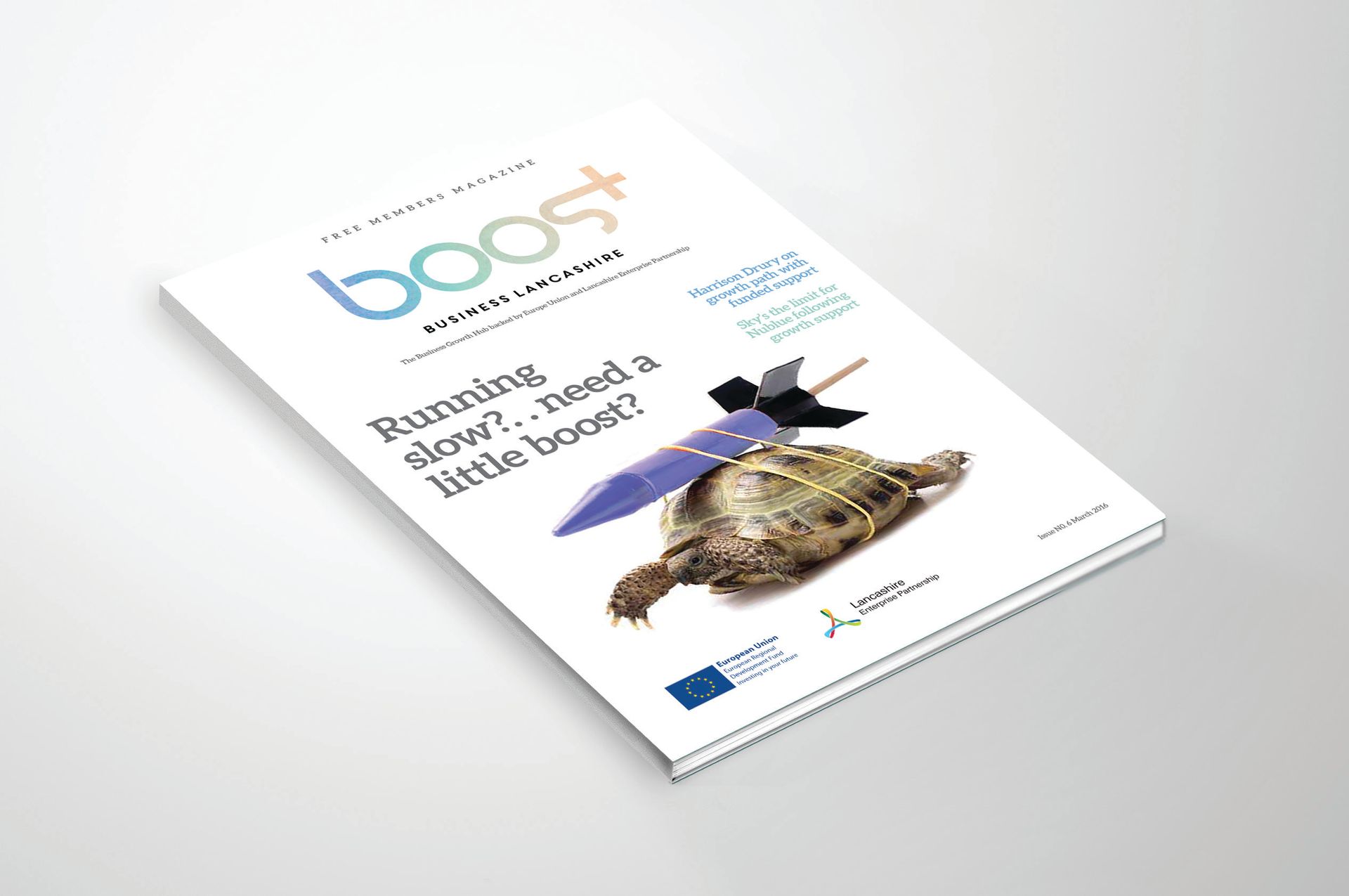 A Boost marketing pamphlet features a cartoon turtle carrying a rocket, with European Union branding at the bottom.