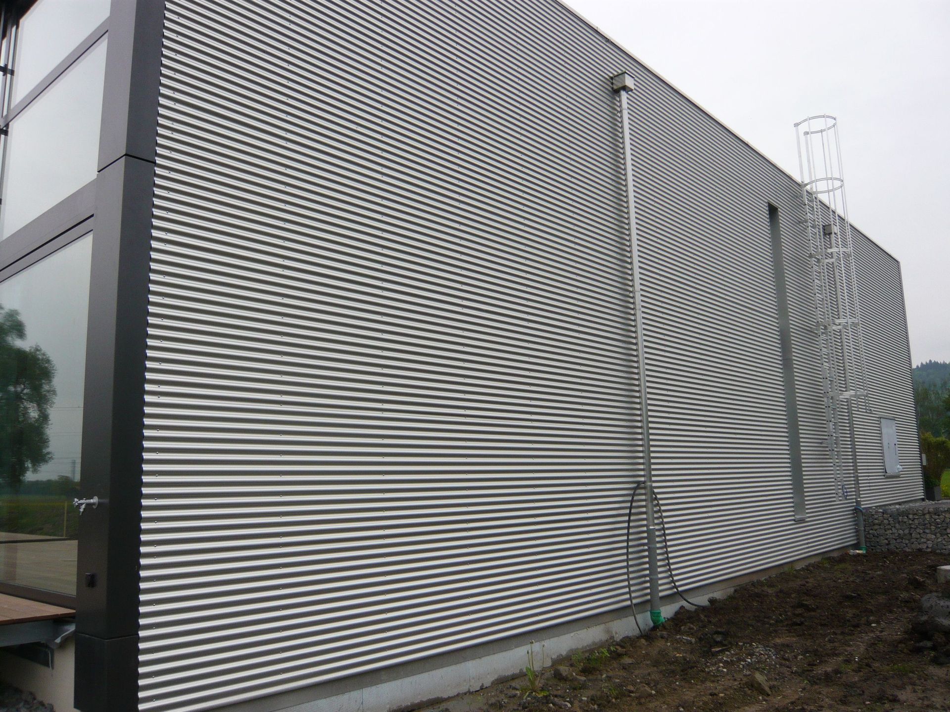 Fassaden - Neuhaus Dach GmbH - Neuhaus SG