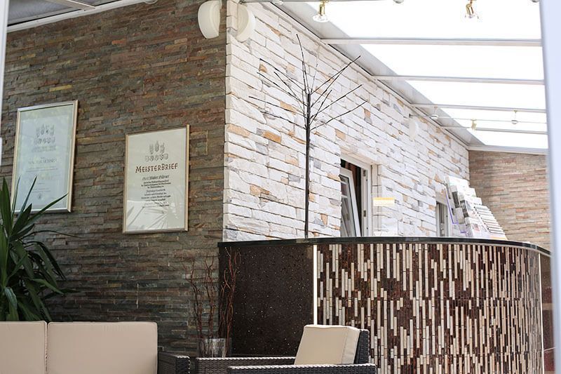 Fliesen Hübner GmbH Natursteinfassade