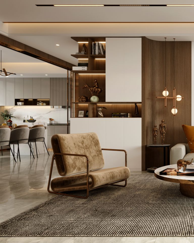 Salon moderne ouvert avec un fauteuil beige, des touches de bois et une cuisine en arrière-plan