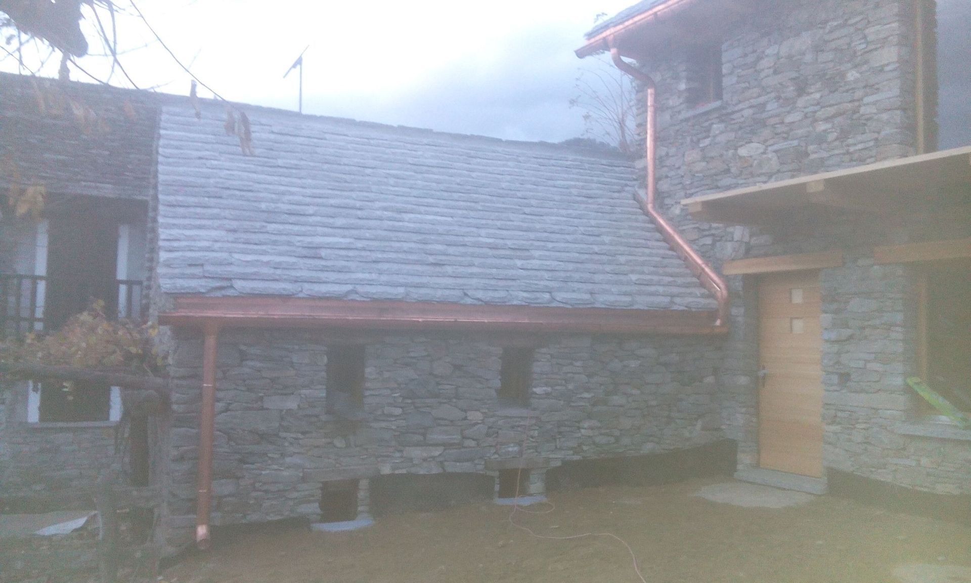 tetto in piode e rame