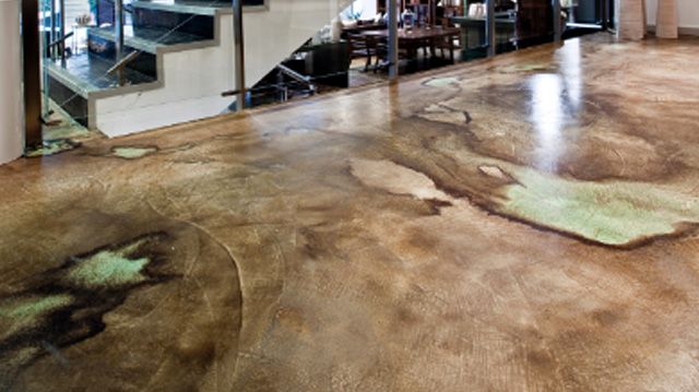 Sol en béton ciré de couleurs beige et vert amande