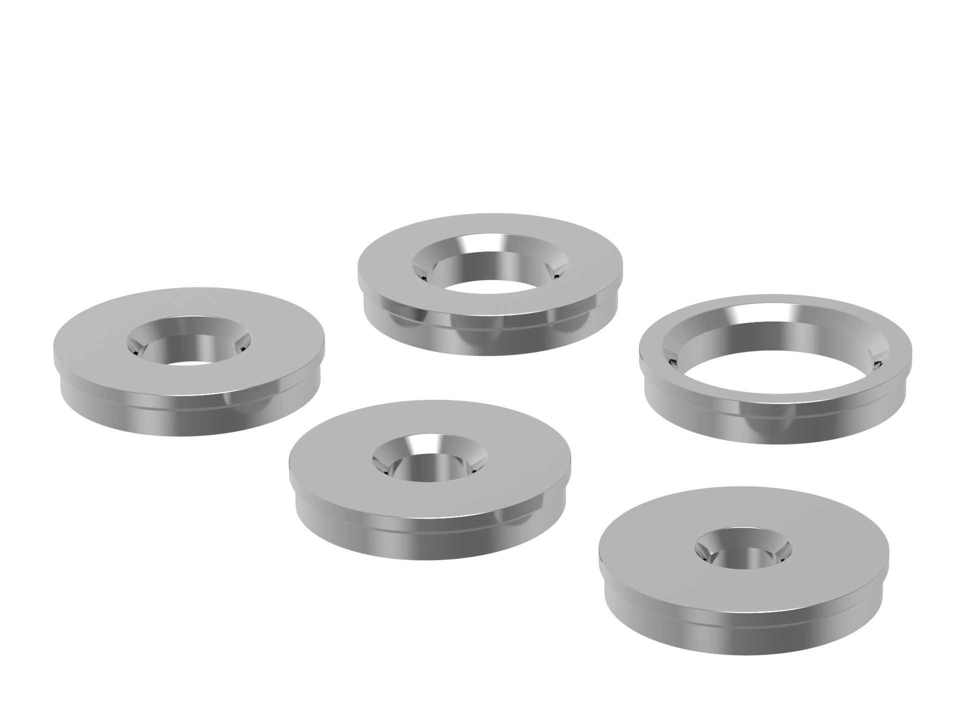 Ein Satz Edelstahlscheiben mit Löchern auf weißem Hintergrund.