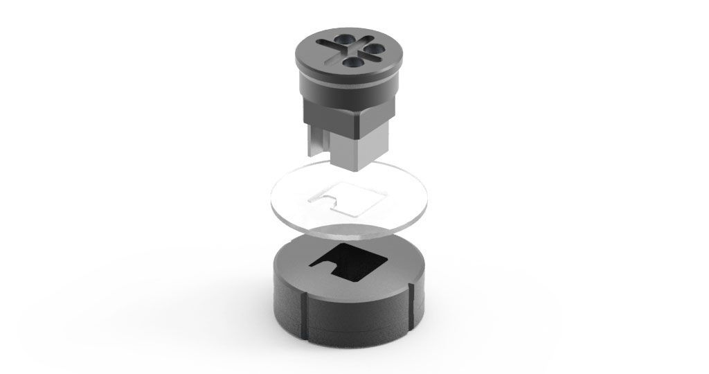 Eine Nahaufnahme eines Metallstücks, das wie eine Schraube aussieht.