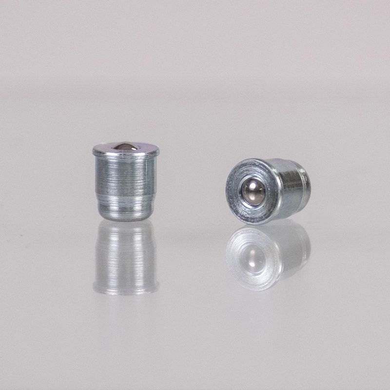 Zwei kleine Kugelrollen aus Metall, jeweils mit sichtbarem Kugellager.