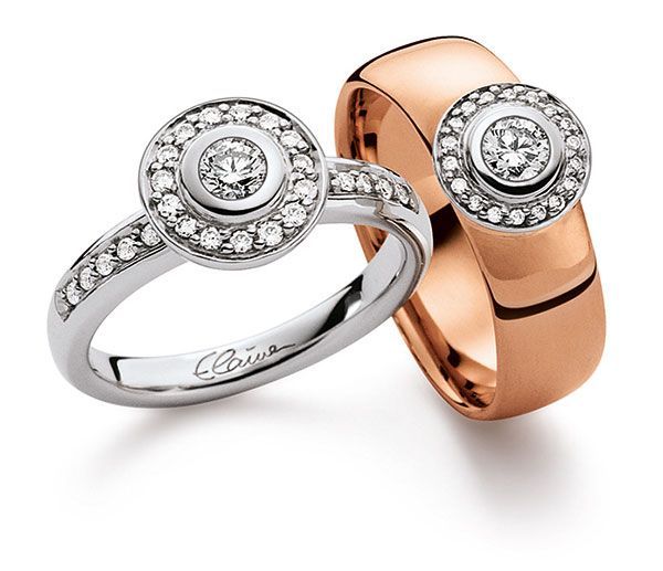 Ein ring dicker in Rosegold und ein dünneren in Silber mit einer Runten Platte mit Steinchen