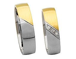 halb silberring, halb goldring mit trennung durch Steinchen