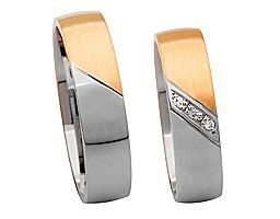 halb silberring, halb rosegoldring mit trennung durch Steinchen