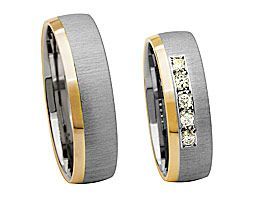 3/4silberring und 1/4 godlring mit 5 großen Steinen