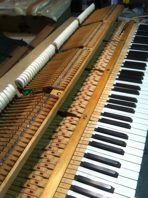 Mécanisme piano à queue restauré