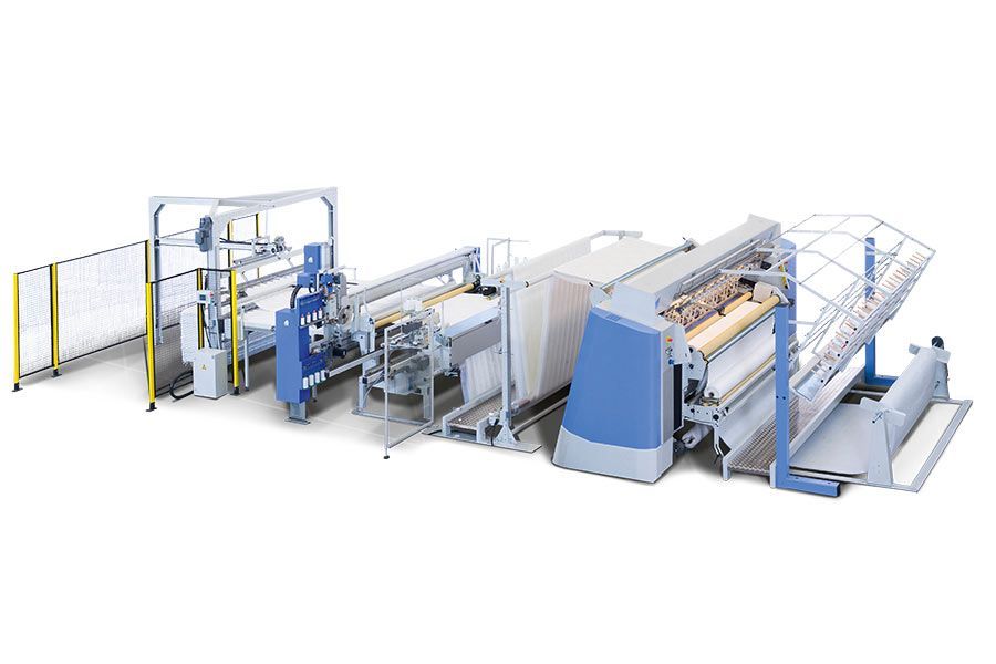 Eine blau-weiße Maschine steht auf einer weißen Fläche