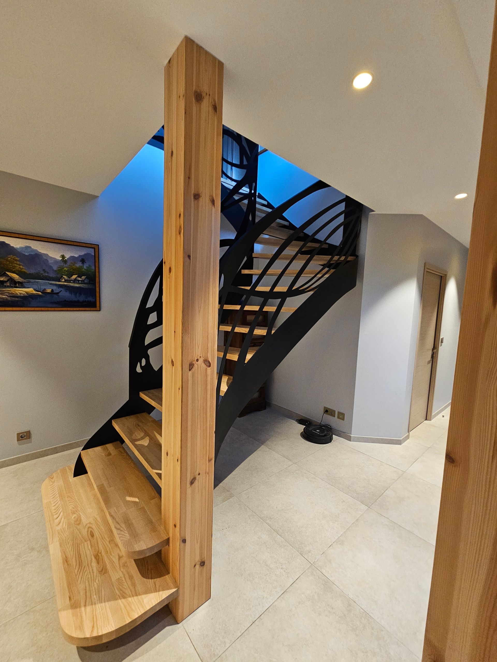 Installation d'un escalier en bois et métal