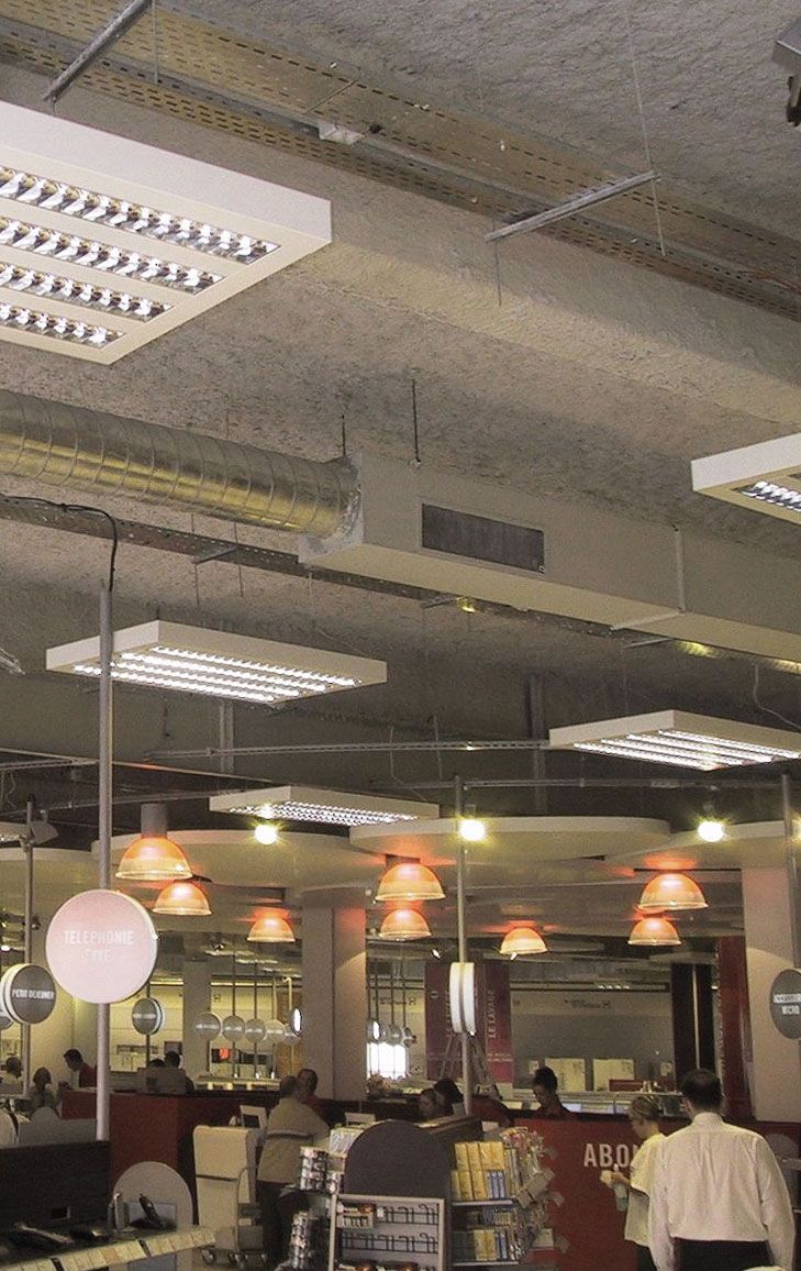 Protection coupe-feu par projection dans le magasin Darty à La Valette