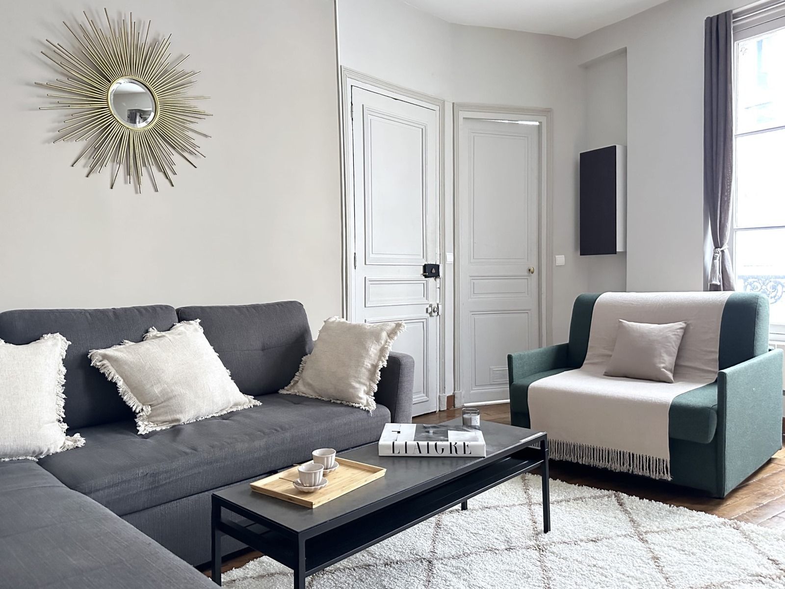 A cosy and comfortable living room in the heart of Paris near Le Marais.