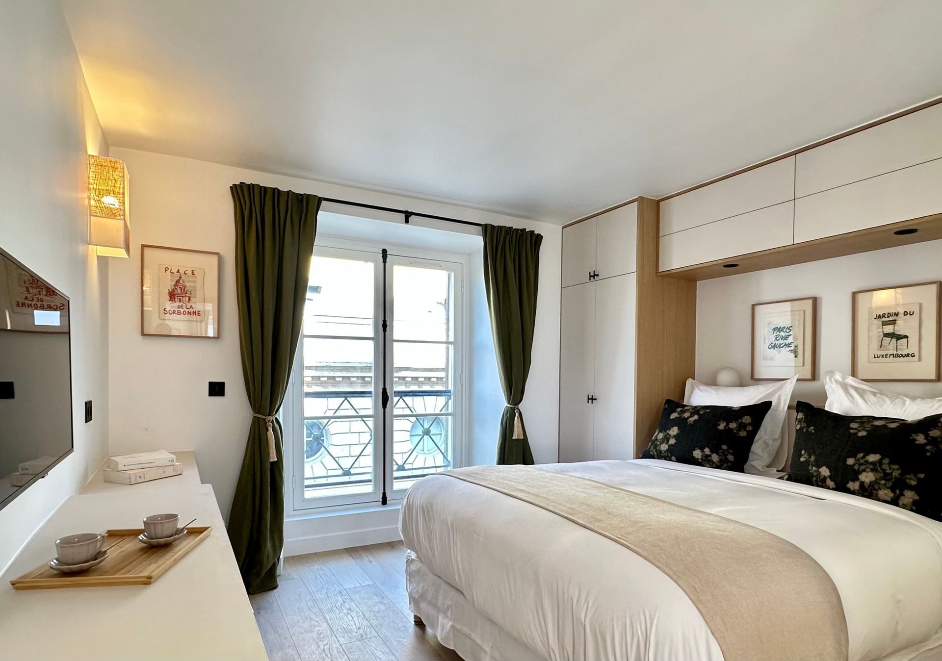 A cosy and luxurious bedroom in the heart of Paris. Enjoy your stay with us during your holidays in France.