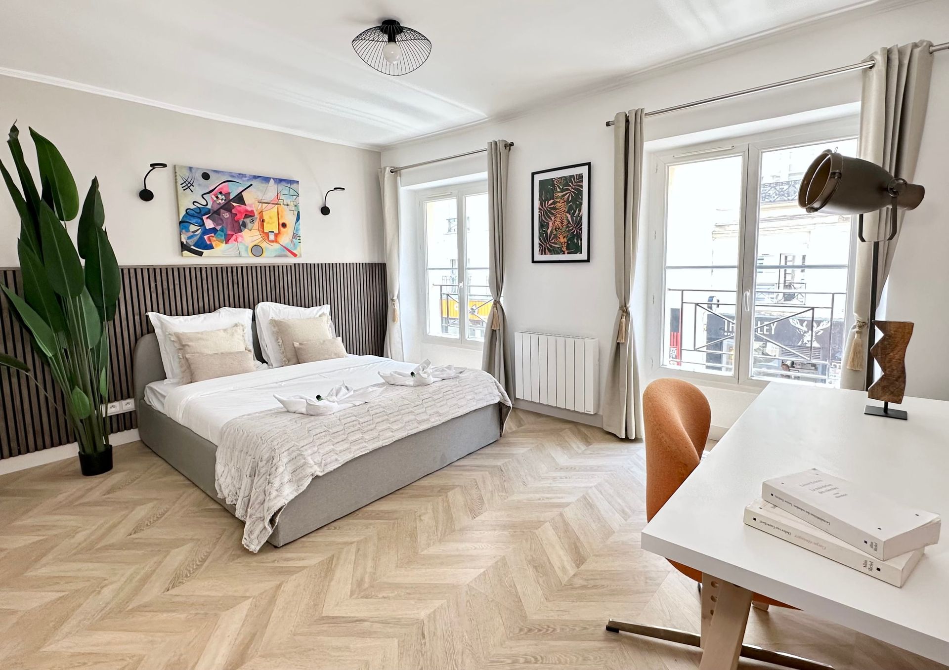 A cosy and luxurious bedroom in the heart of Paris. Enjoy your stay with us during your holidays in France.