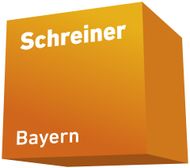 Orangefarbenes 3D-Würfellogo mit weißer Schrift „Schreiner“ und „Bayern“