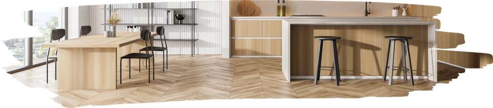 Une cuisine ouverte avec un parquet en bois au sol.