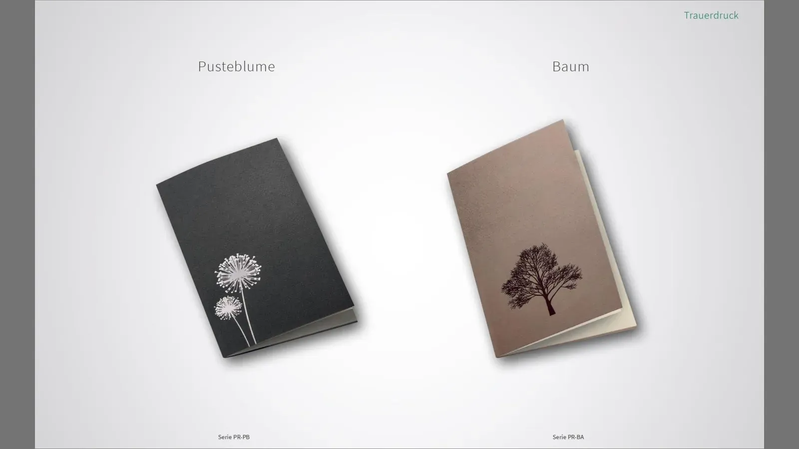 Ein schwarzes Buch mit einer Blume auf dem Cover und ein braunes Buch mit einem Baum auf dem Cover