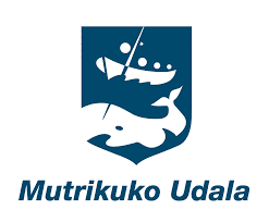 Un escudo azul con una ballena y un barco sobre él.