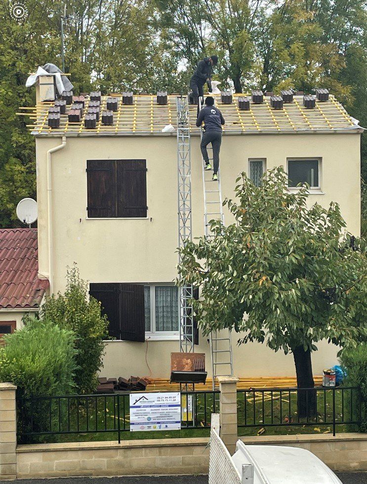 Pose de tuiles neuves