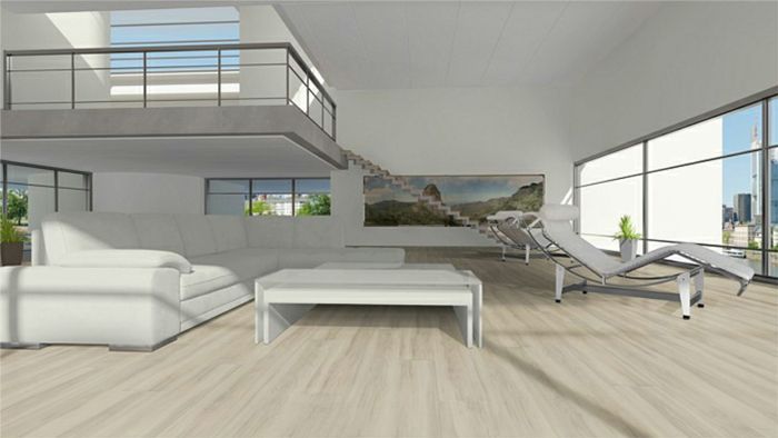 Ein Wohnzimmer mit weißen Möbeln und einem Balkon