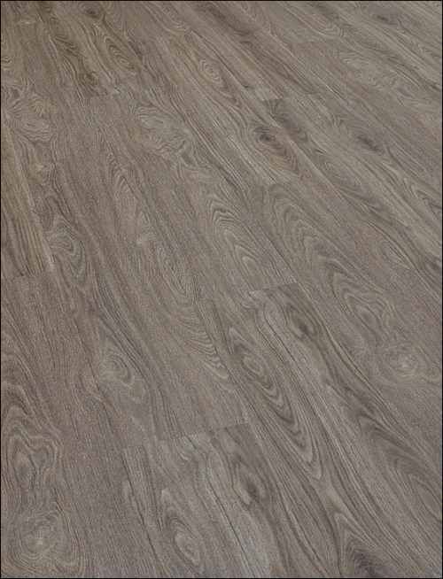 Eine Nahaufnahme eines Holzbodens in einem Raum.