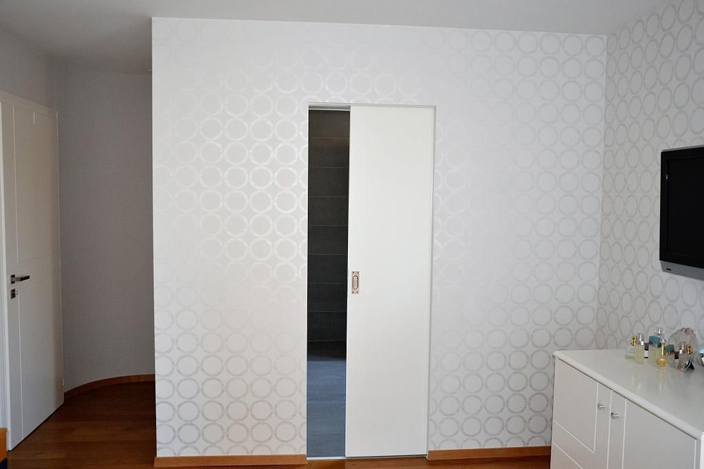 Porte coulissante encastrée - Nerini Peinture SARL