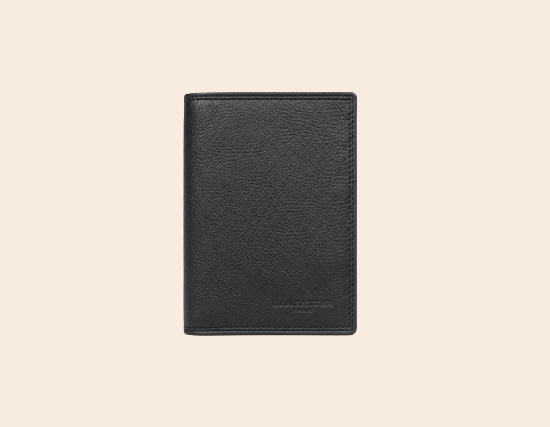 Carnet noir texturé sur fond beige clair