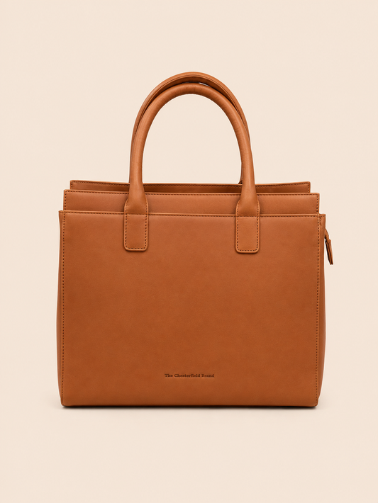 Sac cabas en cuir fauve à double anse sur fond beige